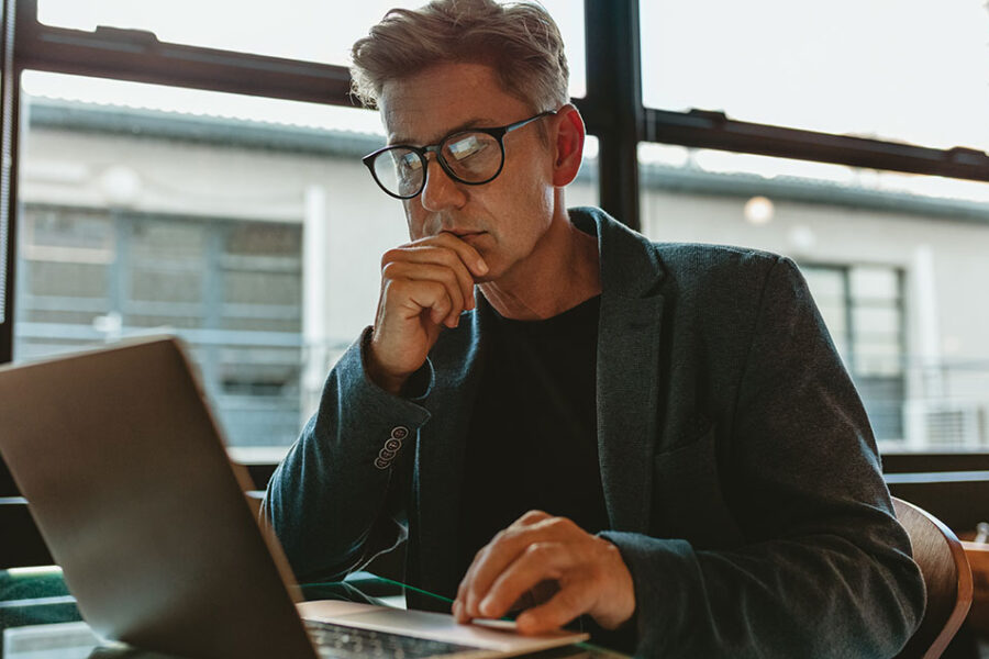 Blog Feature Image Man using laptop