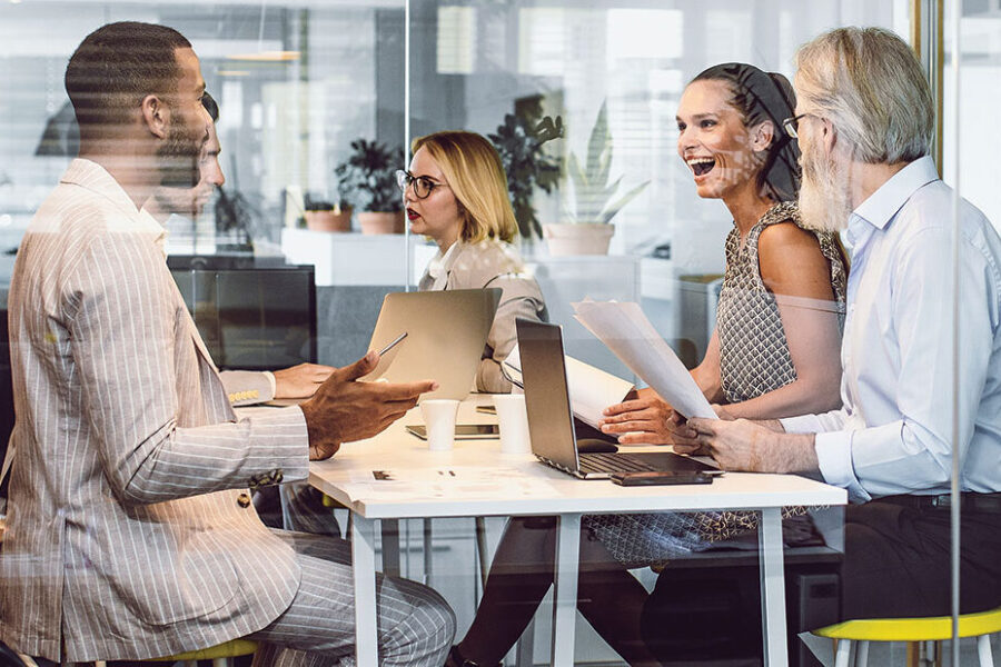 Business Interruption Insurance Blog Feature Image of office workers