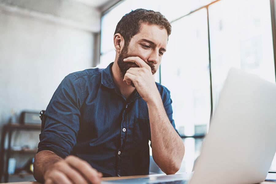 Blog Feature Image Business Man At Desk Monitoring Sweep Accounts