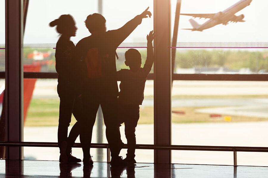 Blog photo_family at airport watching plane take off_Travel Insurance
