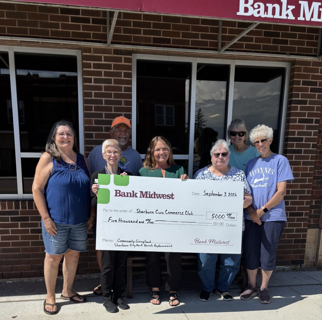 Image of check presenation to the Sherburn Civic Commerce Club from Bank Midwest Community Fund.